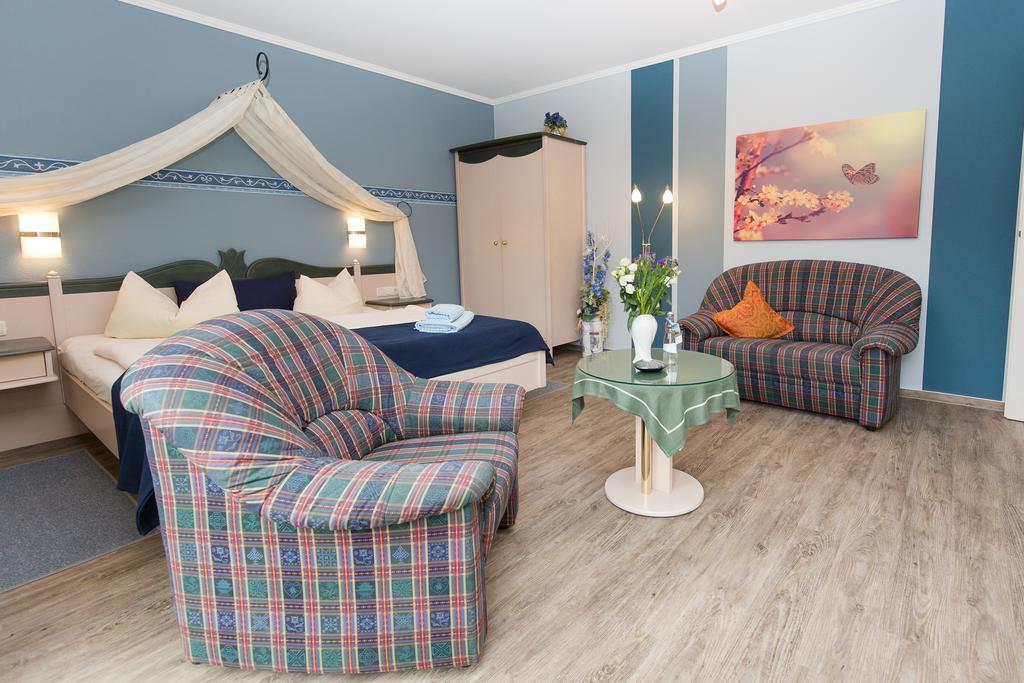 Hotel Garni Am Deich Zingst Oda fotoğraf