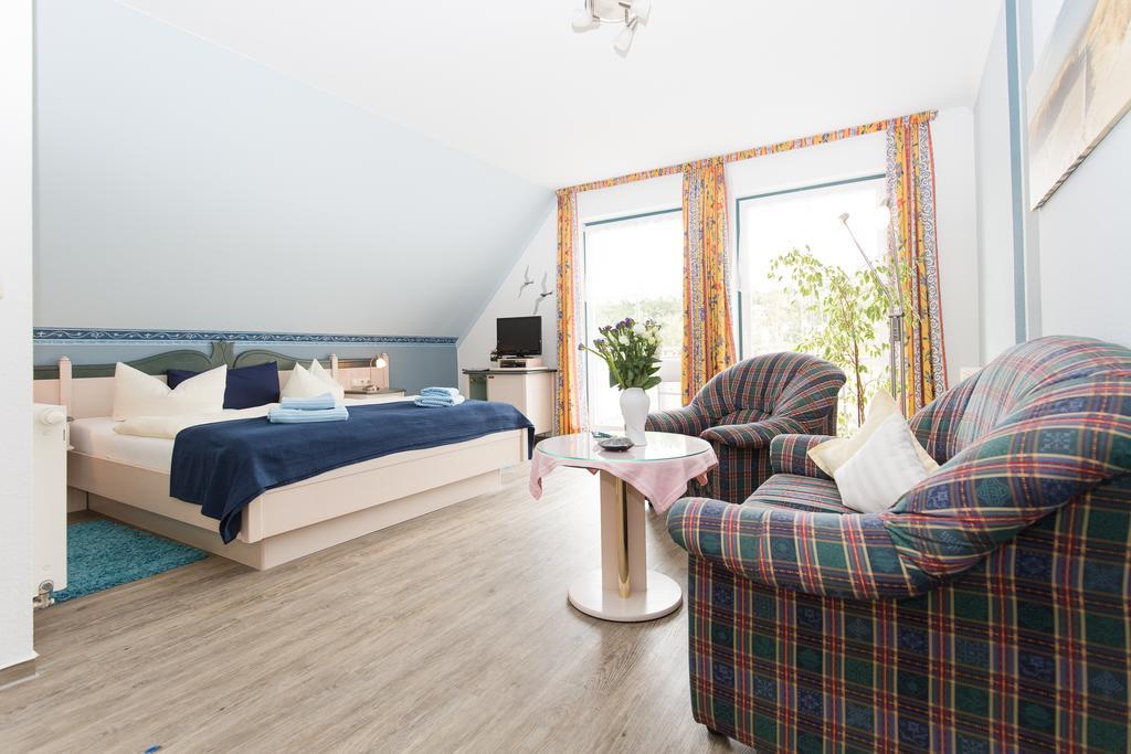 Hotel Garni Am Deich Zingst Oda fotoğraf
