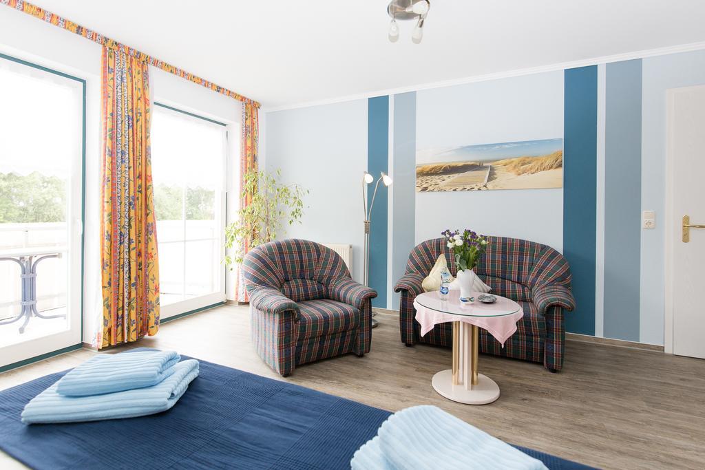 Hotel Garni Am Deich Zingst Oda fotoğraf